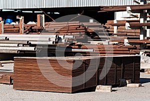 Metal plates stacked on warehouse