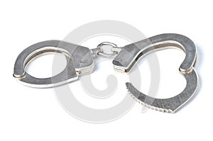 Metal police handcuffs isolated on white background