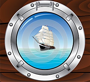 Metal porthole and tallship in the ocean