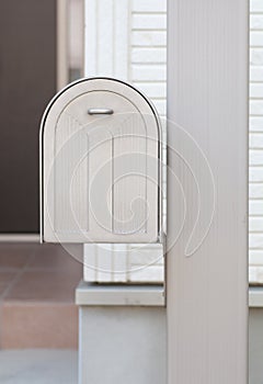 metal post box in front house