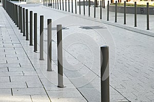 Metal posts as boundary of a street