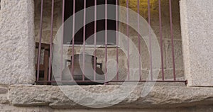 Metal pot container on old stone balcony of andient house villa