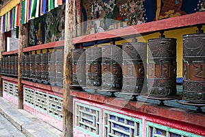 Metal Praying Cylinders In A Buddhist Temple