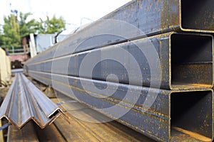 Metal profile pipe of rectangular cross section in packs at the warehouse of metal products