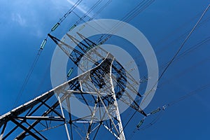 Metal pylon carrying overhead electric cables of high voltage lines