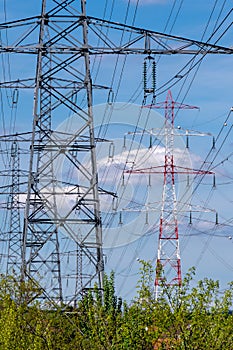 Metal pylons carrying overhead electric cables of high voltage lines