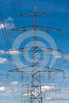 Metal pylons carrying overhead electric cables of high voltage lines