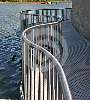 Metal railing by the water