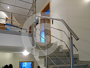 Metal railings in a room or hotel on the stairs between floors