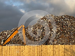 Metal recycling compound showing large heap of rubbish
