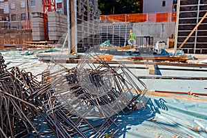 Metal reinforcing, steel bars stacked for construction placed on the building site