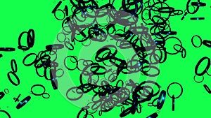 Metal rings flying and moving in random directions slowly on green sceen.