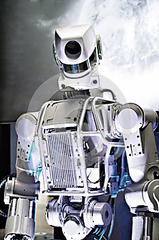 Metal robot on space background