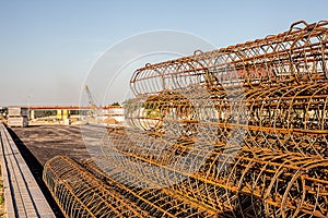 Metal rods and building site