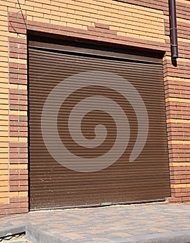 Metal roller shutter installation for house entance protection photo