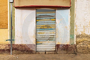 Metal rolling door in the village of Faiyum