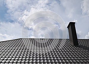 Metal roof and sky clouds