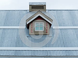 Metal roof small dormer window architecture detail photo