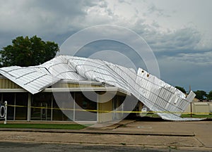 Metal roof storm damage, commercial building