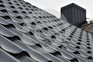 Metal roof with water drops after rain