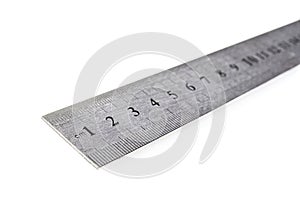 Metal ruler in centimeters or inches. Measuring tool on the white background.