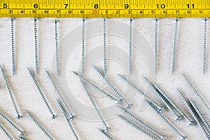 Metal ruler, centimeters and millimeters on the yellow ruler