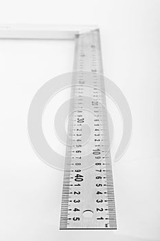 Metal ruler on white background