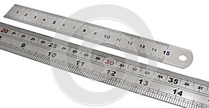 Metal rulers isolated on white