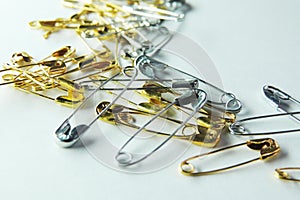 Metal safety Pin on white background