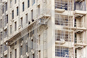 Metal safety scaffolding in a skyscraper under construction