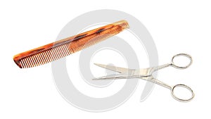 Metal scissor and comp isolated photo