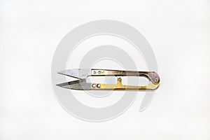 Metal scissors in the form of a crocodile isolated on a white background, a construction tool