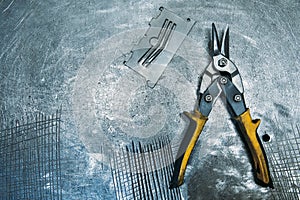 Metal scissors lying on table