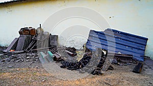 metal scrap junk waste kept outside, rusty material of industries and construction left over, brown rust, junk waste of industries