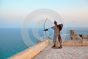 Metal Sculpture of Warrior Muslim archer with a crescent in Santa Barbara Castle, Alicante, Spain