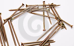 Metal self-tapping screws on a white background