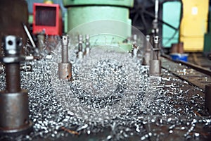 Metal shavings on lathe closeup, nobody