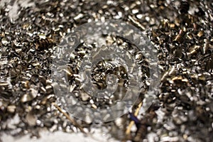 Metal shavings in metallurgy close up. selective focus, top view
