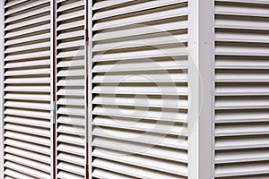 Metal sheet louver or slats on the wall of warehouse