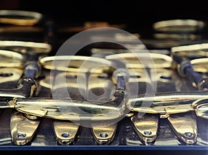 Metal shiny door handles in window shop