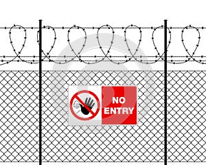 Metal sign NO ENTRY on barbed wire fence