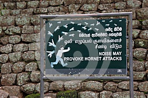 Sign: `Beware of hornet attack` on Lions rock / Sigiriya