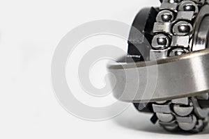 Metal silver ball bearing with balls on white isolated background. Bearing industrial. Part of the car
