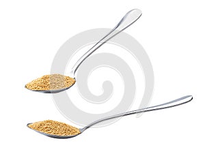 Metal spoon with amaranth isolated on white background