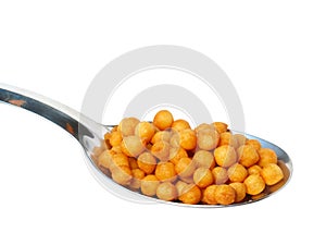Metal spoon with croutons isolated