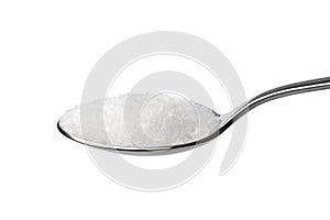 Metal spoon with a sea salt on white background