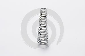 Metal spring isolated on white background.Copy space
