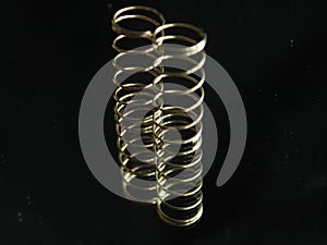 Metal spring round helical spiral reflection elastic photo