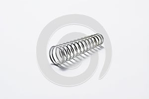 Metal spring  on white background.Copy space photo