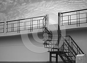 METAL STAIR WITH SKY BACKGROUND